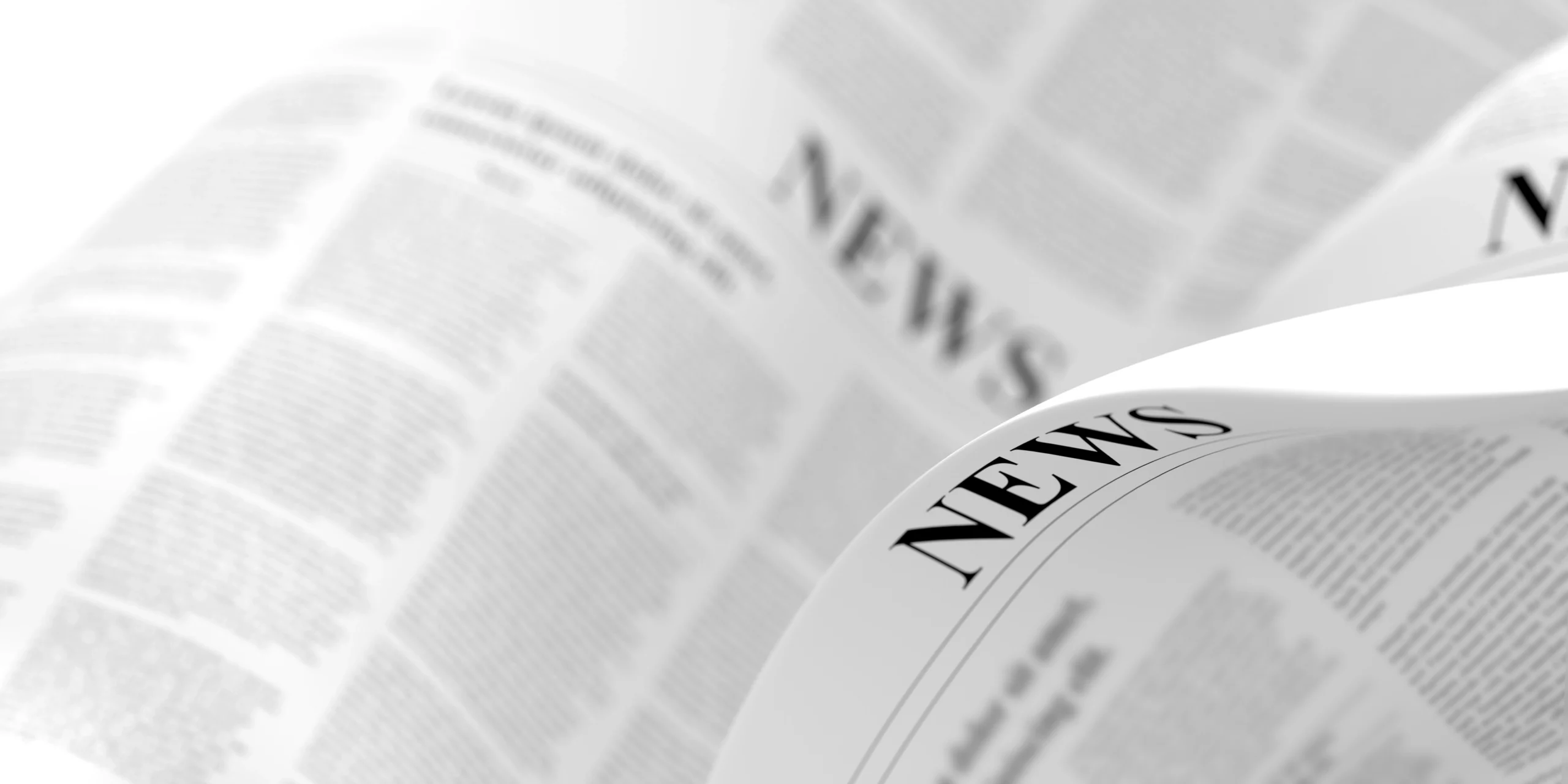 Image of a newspaper open